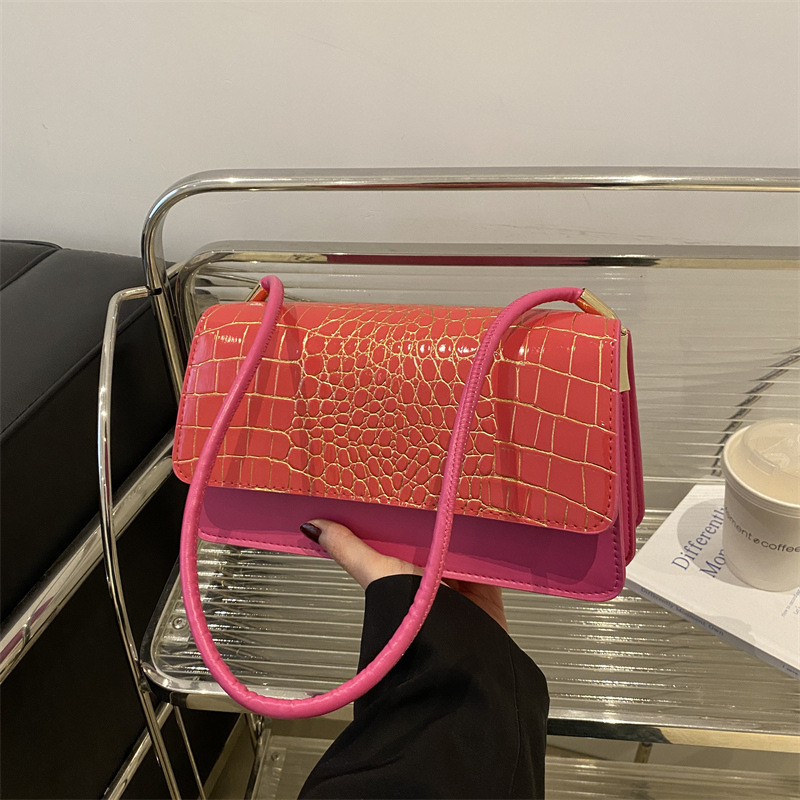 2025 primavera nuevo color sólido temperamento cocodrilo bolso de mano bolso de hombro de moda moda moda elegante bolso de mujer debajo de las axilas