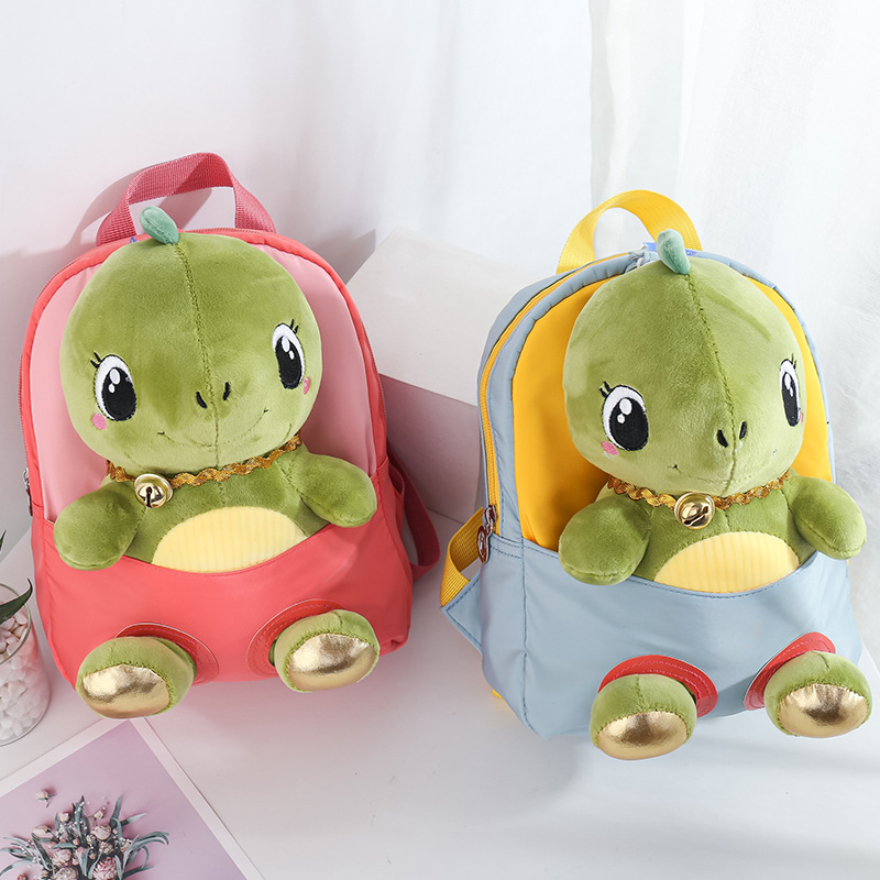 Fábrica de stock nuevo mochila infantil de dibujos animados muñecas de peluche dinosaurios desmontables mochila de jardín de infantes comercio exterior