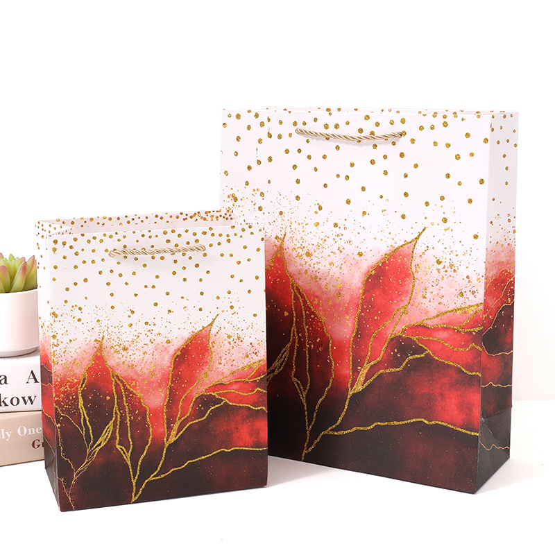流沙创意纸袋 撒金粉白卡手提袋 现货礼品袋批发 服装礼物包装袋