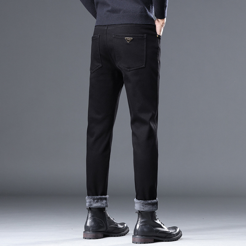 Guangzhou Xintang Pantalones vaqueros de los hombres de otoño e invierno nuevos Pantalones rectos regulares de los hombres jóvenes simples pantalones a juego