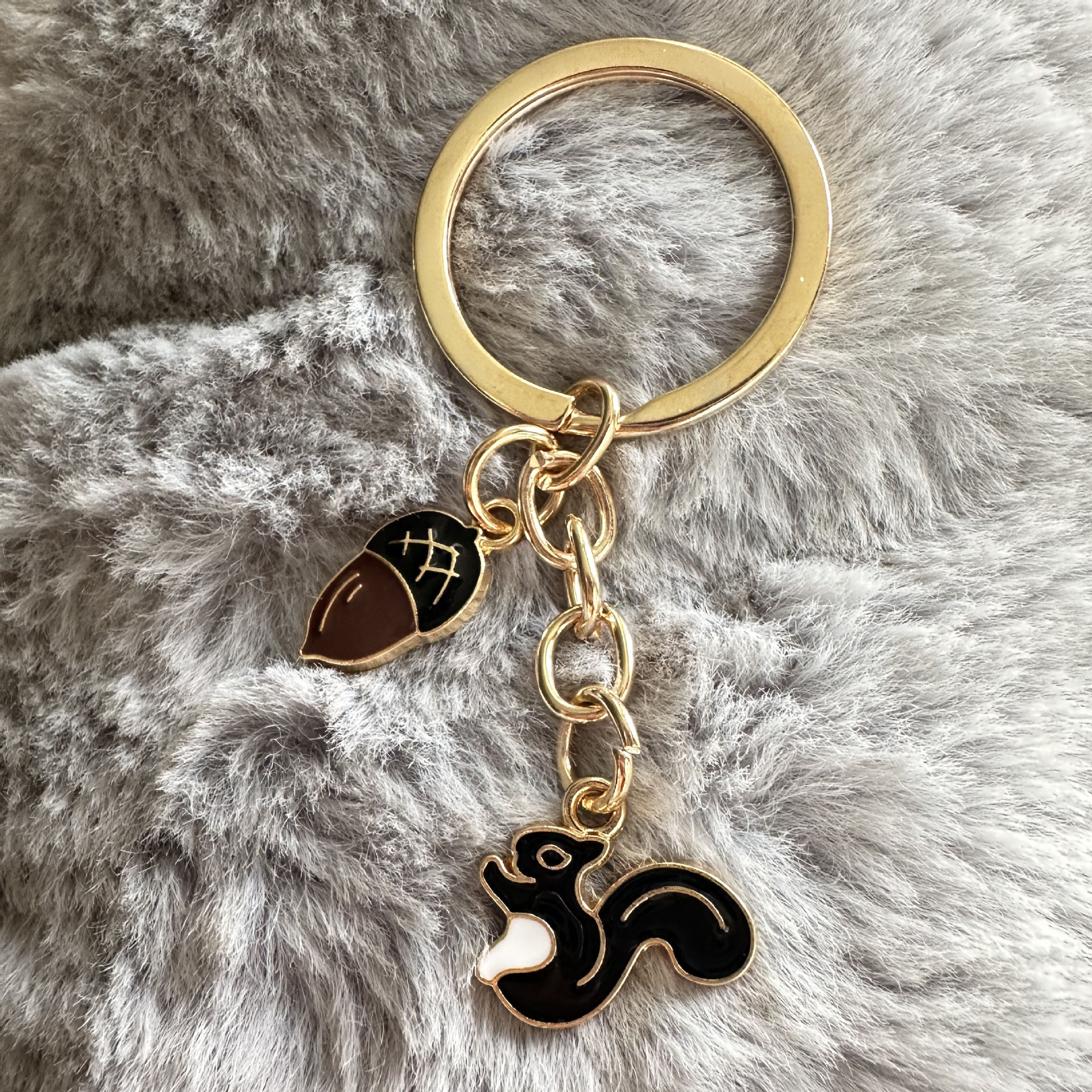 Ventas transfronterizas personales colgantes perlas abejas colgantes girasoles joyas de Navidad ardilla llaveros