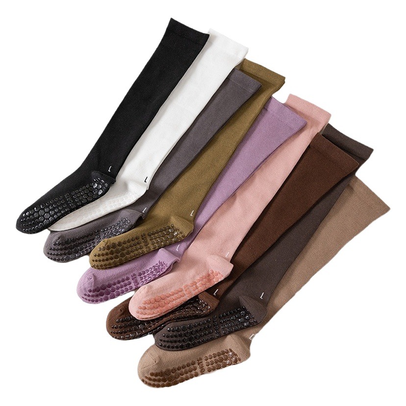 圧力の靴下の子供のヨガの靴下の高い筒の綿の純色のふくらはぎの靴下の卸売りのフィットネスのダンスの滑り止めのプラティのストッキング