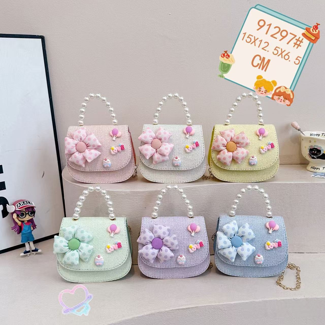 Nuevo comercio exterior pequeña fragancia niñas hombro mochila de moda perla arco bolsos de niños bolsos de cambio de dibujos animados