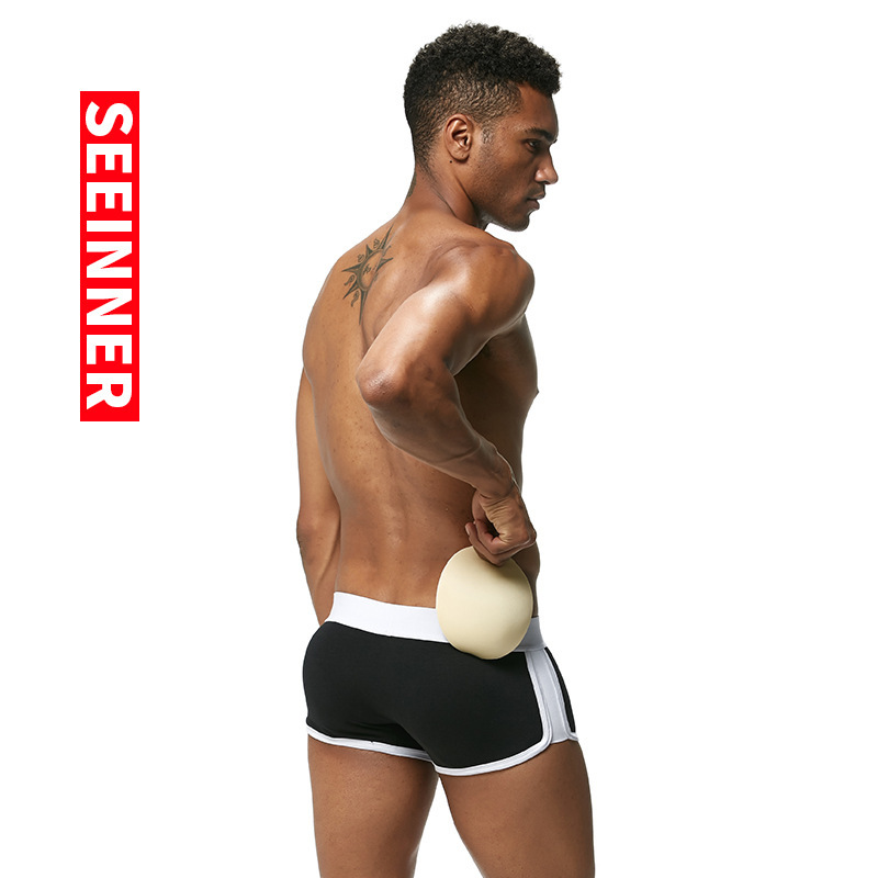 Ropa interior masculina para exportación en AliExpress y Amazon, calzoncillos bóxer de algodón con relleno en la cadera, color liso, nuevo diseño transpirable que realza la cadera.