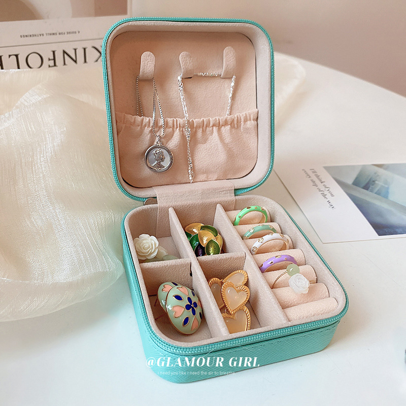 Caja de joyería portátil pequeño anillo exquisito pendientes caja de almacenamiento europeo de gama alta de lujo bolsa de joyería de viaje