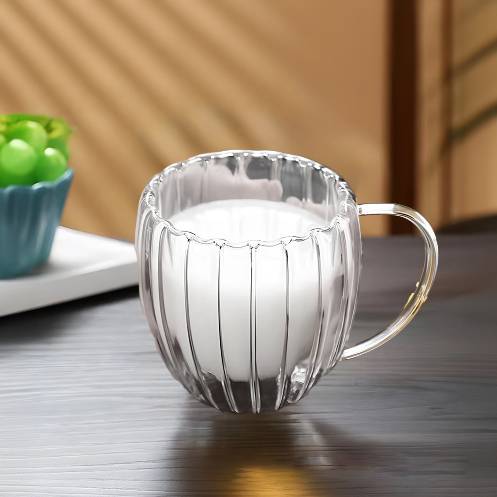Taza de vidrio de alta borosilicona transparente con mango creativo de alta temperatura resistente a la taza de café