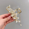 Metal crab pin from pearl, hairgrip with tassels, shark, orchid