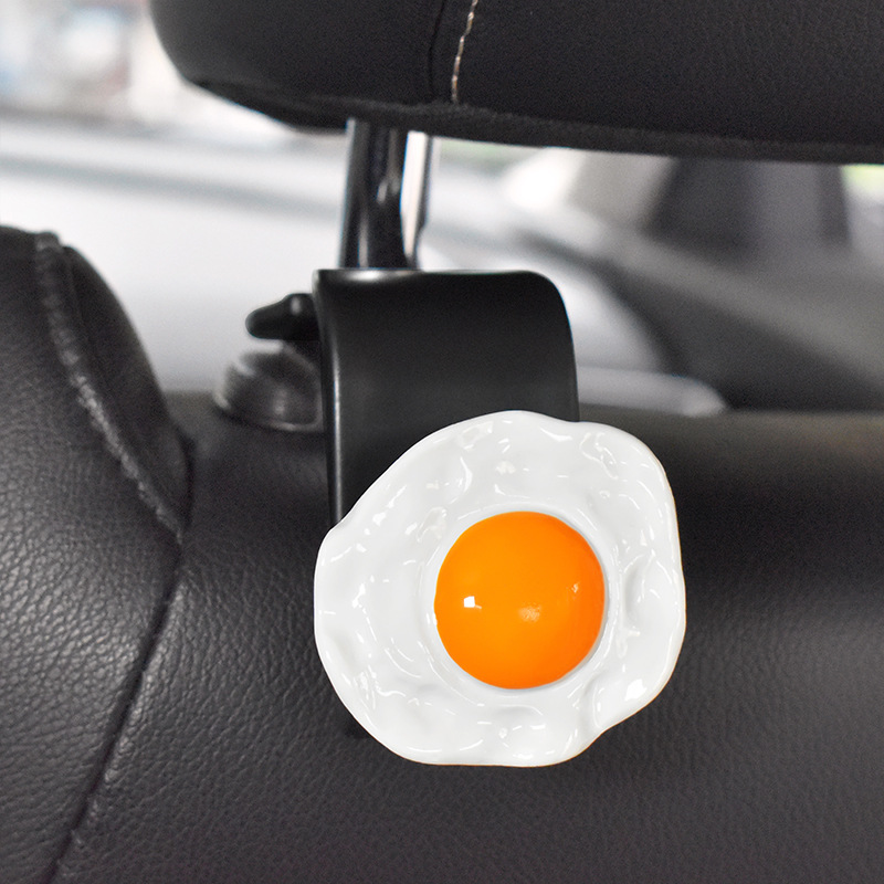 Gancho trasero del asiento del automóvil 2024 nuevo gancho pequeño multifuncional para automóvil lindo gancho para colgar en el automóvil de dibujos animados trasero