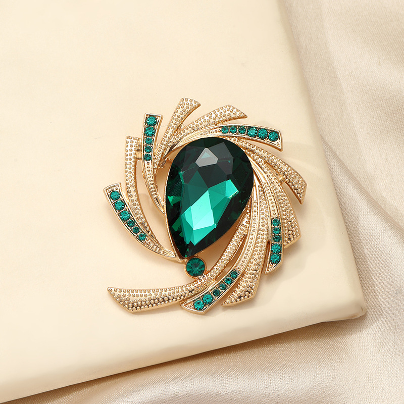 Broche de luxe rotative en cristal vert épingle anti-dévoilement_voghion.com