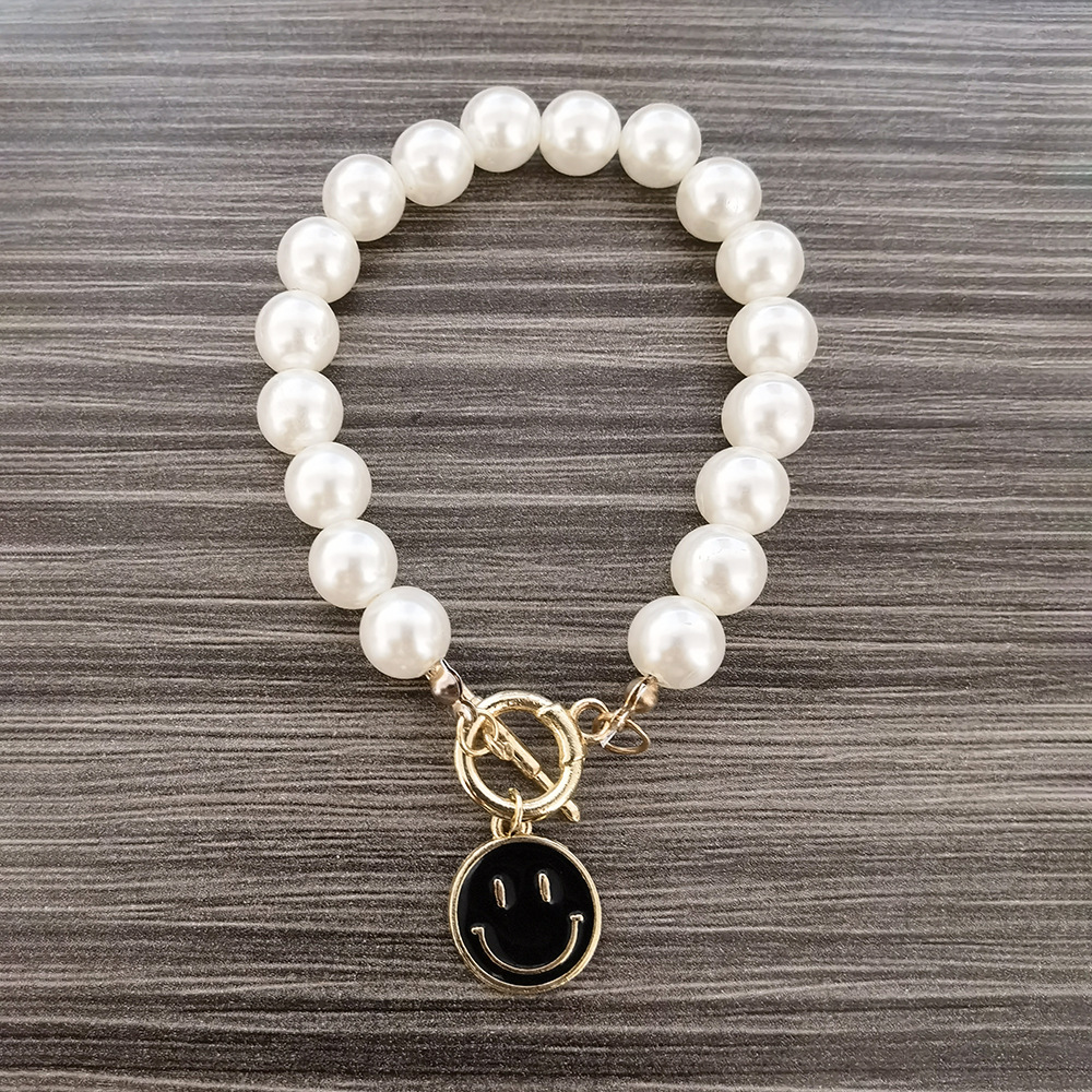 Europe And America Cross Border New Ins Fashion Creative Pearl Smiley Face Bracelet Alloy Dripping Smiley Face Pearl Bracelet For Women display picture 5