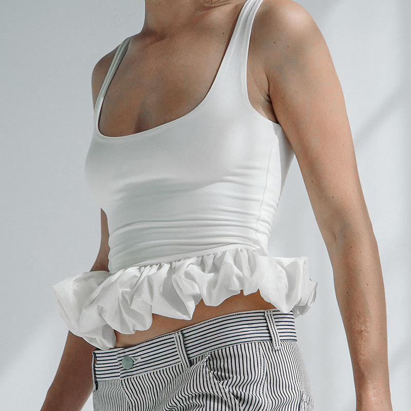 Top corto sexy sin mangas con corte ajustado y espalda descubierta, de color liso, estilo europeo y americano, para mujer, nueva colección primavera-verano 2026.