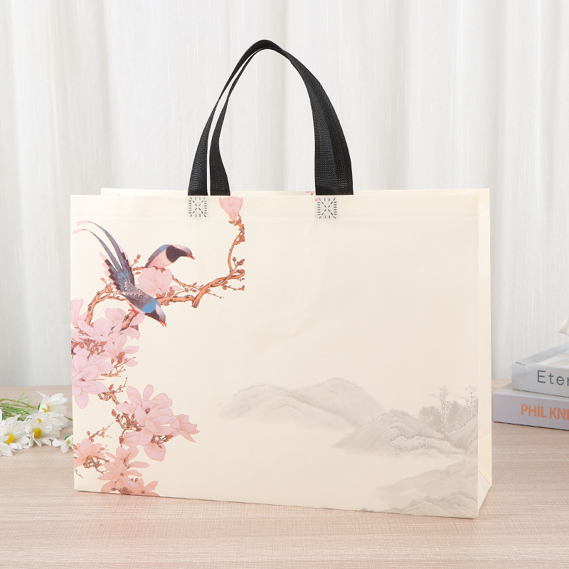 Bolsa de mano no tejida multi-especificación plegable con regalo de mano bolsas de compras de mano logotipo impresa en color bolsas de tela no tejida