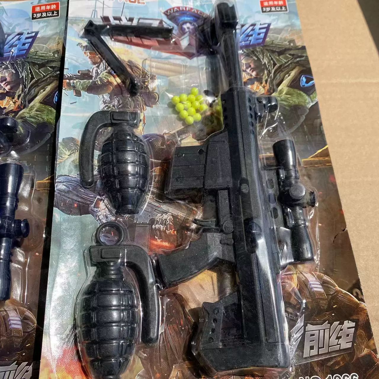 Juguetes infantiles pistolas de tarjeta de papel juguetes 2 yuanes al por mayor ventosa de plástico pistola de bala suave de dibujos animados estandos férula de tiendas departamentales al por mayor