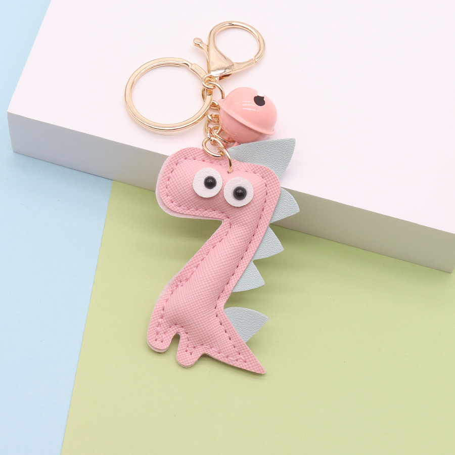 Llavero dinosaurio creativo PU bolso de cuero colgante personalizado campana de cuero llavero de coche adornos regalo