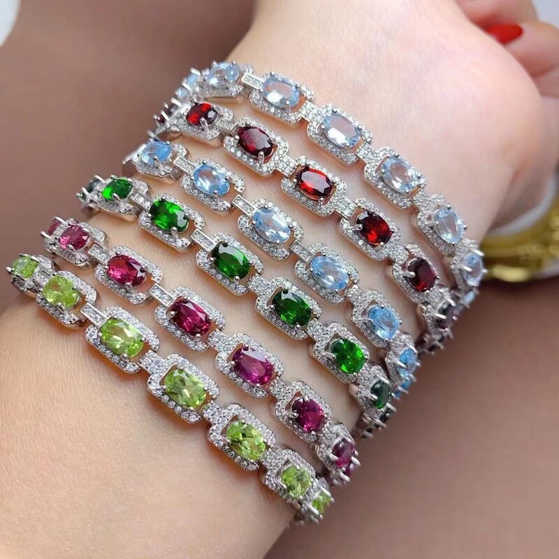 New Style Gemstone Bracelet with 925 Silver Inlay, Natural Peridot, Blue Topaz, Magnesium-Aluminum Garnet, and Multiple Diamonds New Style Gemstone Bracelet with 925 Silver Inlay, Natural Peridot, Blue Topaz, Magnesium-Aluminum Garnet, and Multiple Diamonds