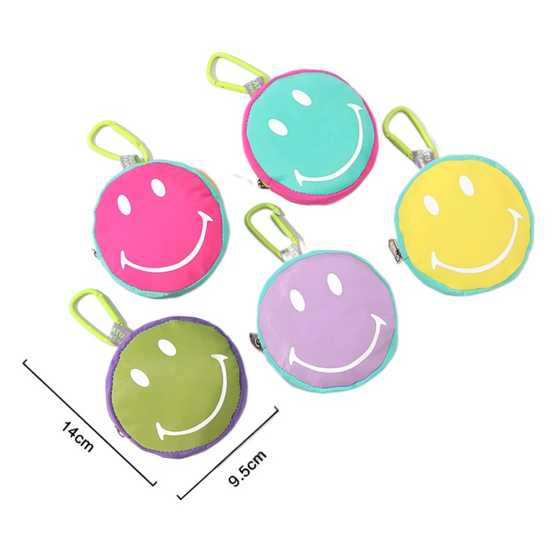 Nueva bolsa de cara sonriente de color caramelo de dibujos animados mini caja de color sólido colgante cambio bolsa de almacenamiento universal hombres y mujeres moda