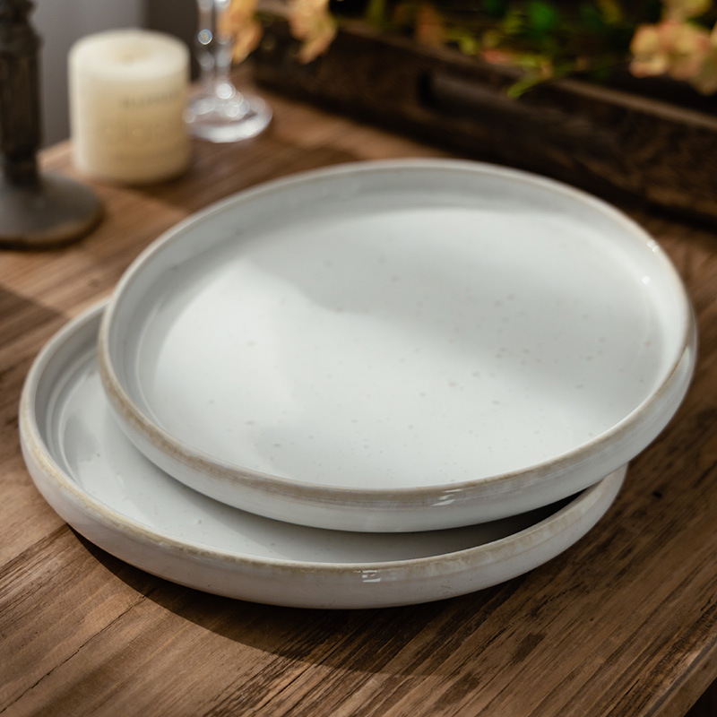 Diseño de plato de cerámica crimpado plato de espagueti plato de cubierta de color sólido al por mayor plato redondo casero plato de platos poco profundos