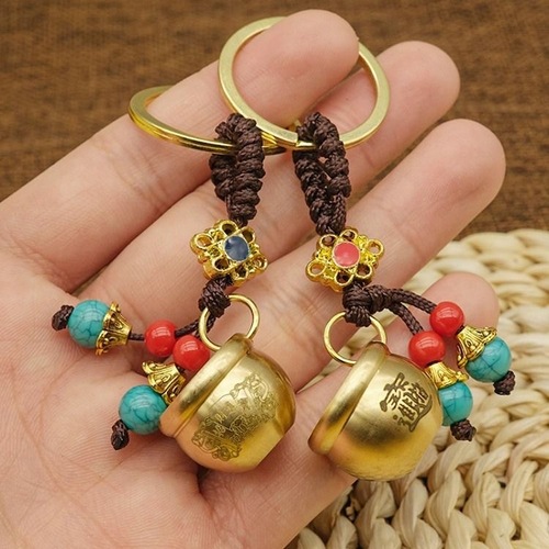 Brass millet cylinder pendant Baifu cylinder key chain pendant creative small copper cylinder men's and women's car key chain pendant