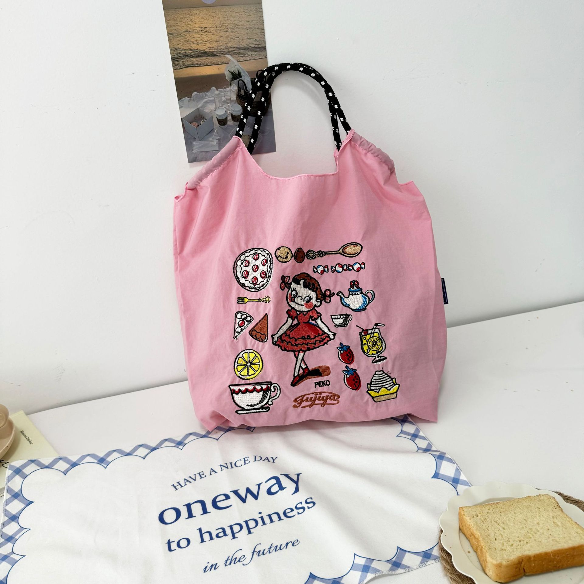 厳選ネット赤同項日系ボールチェーン刺繍レジ袋女性ファッション小衆大容量シングルバッグ潮