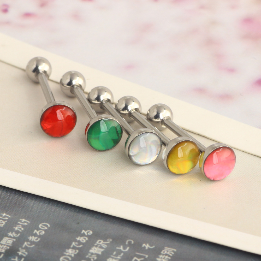 Silver pointed spike labret stud material detail
