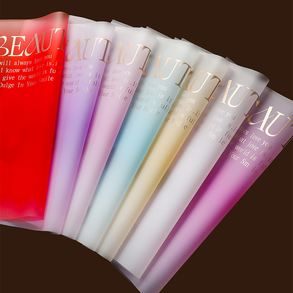 Li Zhi Ran estilo coreano estampado en oro Inglés papel de embalaje de regalos de flores impermeable día de San Valentín ramo de flores papel de envoltura