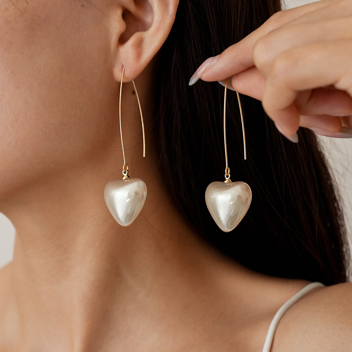 Europa y América retro transfronteriza perla amor gancho de orejas vacacionales estilo de estilo elegante pendientes nicho de alta calidad pendientes para mujeres