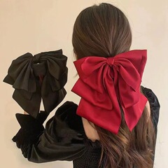 フランスの優しい気質のサテンの特大サイズの蝶結びのリボンのヘアピンの女性の後頭部のクリップの髪飾りのクリップ