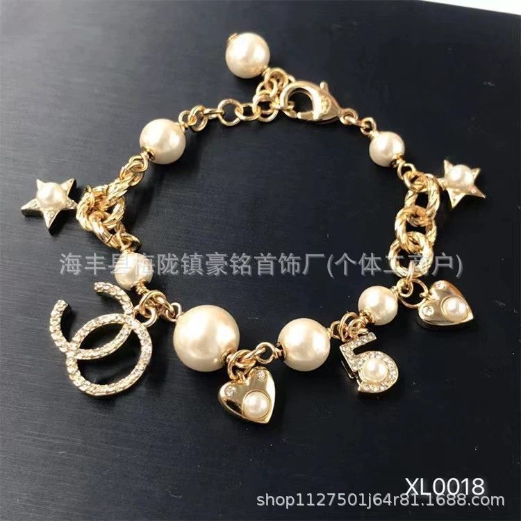25 新しい Xiaoxiang ネックレス女性の真珠五芒星鎖骨チェーンハイエンドダブル C レターセーターチェーンメーカー卸売|undefined