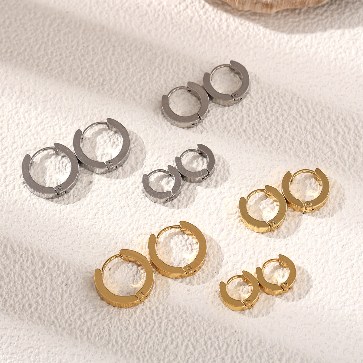 TENA Europa y los Estados Unidos venta caliente aretes redondos de acero inoxidable ligero lujo de alto nivel anillo sensorial geometría joyería pendiente transfronteriza