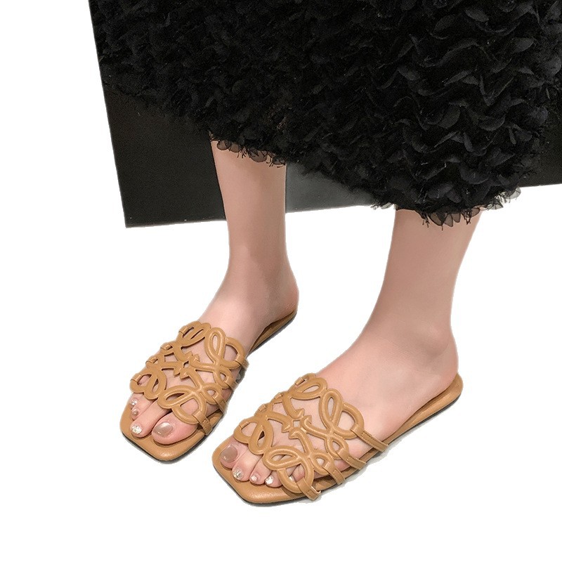 2025 nuevas zapatillas de playa casuales transfronterizas Nigeria Sudeste de Asia 3D calado fondo plano de una sola palabra zapatillas de mujer