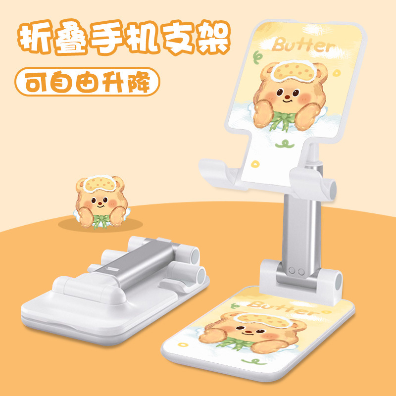 Kt猫の漫画の携帯電話の支柱はタブレットの怠け者のデスクトップの新型の生放送のネット課の神器のベッドの頭の折り畳みの支柱を適用します。|undefined