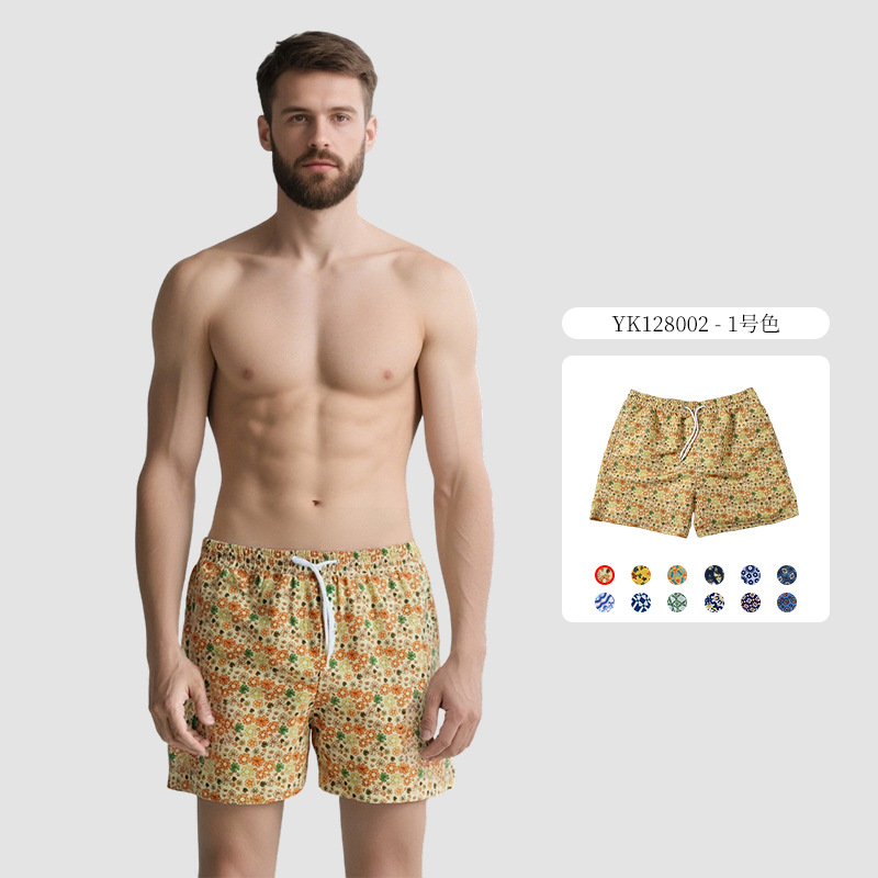 Pantalones de cuatro puntos florales de piel de melocotón para hombre, bañador casual de playa de tamaño europeo, forro de secado rápido, pantalones de playa de vacaciones junto al mar