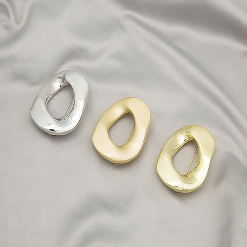 European and American fashionable glossy irregular geometric design round brooch creative personalized suit accessories