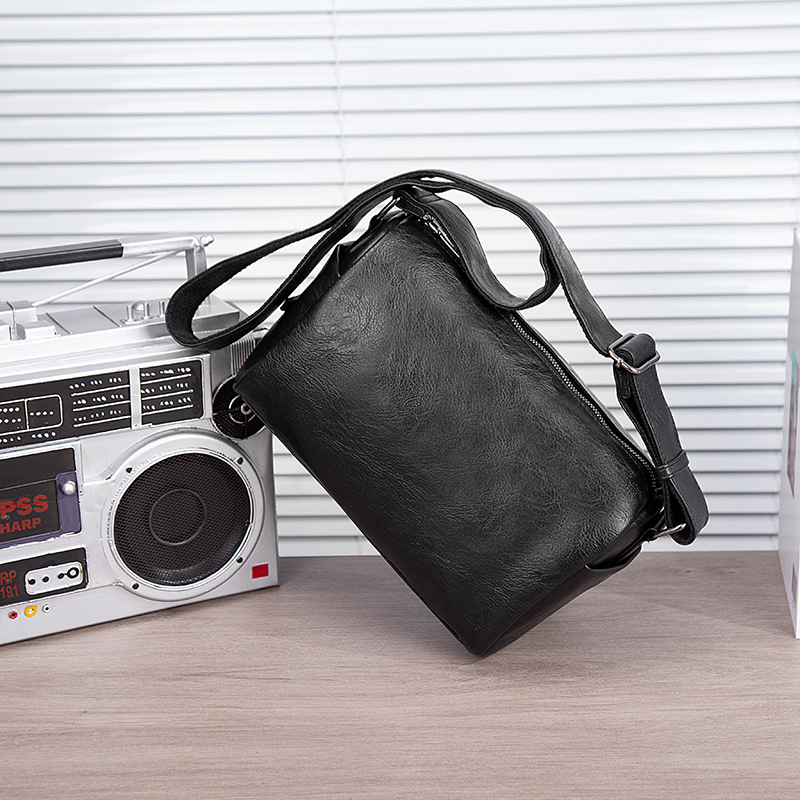 Factory direct new men's shoulder bag pu soft leather bag messenger bag fashion large capacity backpack a generation of hair