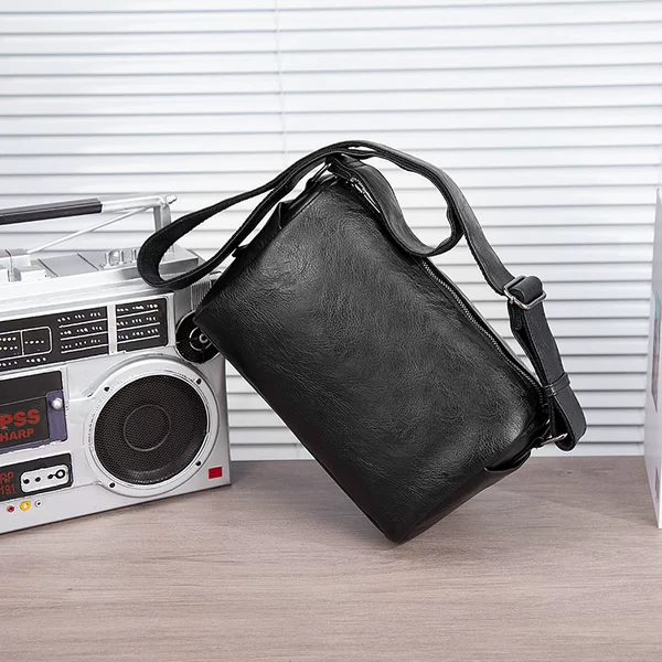 Factory direct new men's shoulder bag pu soft leather bag messenger bag fashion large capacity backpack a generation of hair