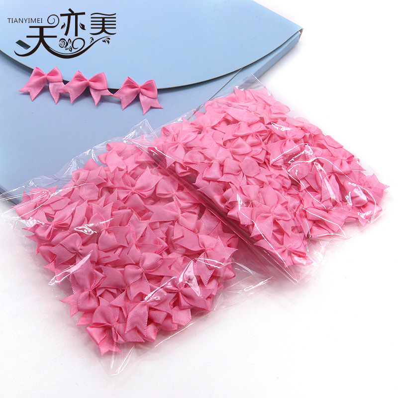 Cinta en stock cinta pequeño arco textil accesorios Rosa cola de milano cinta arco 100