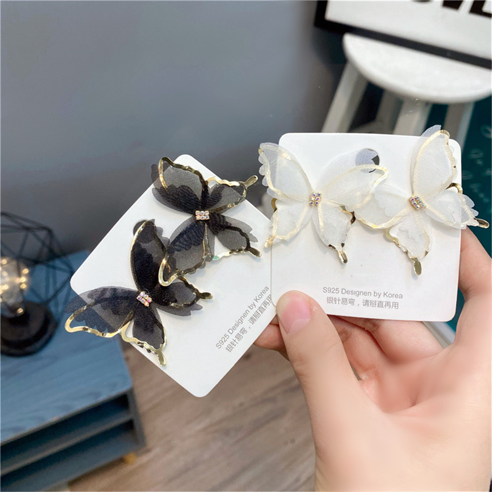 Fashion Hollow Butterfly Diamond-studded Earrings display picture 3