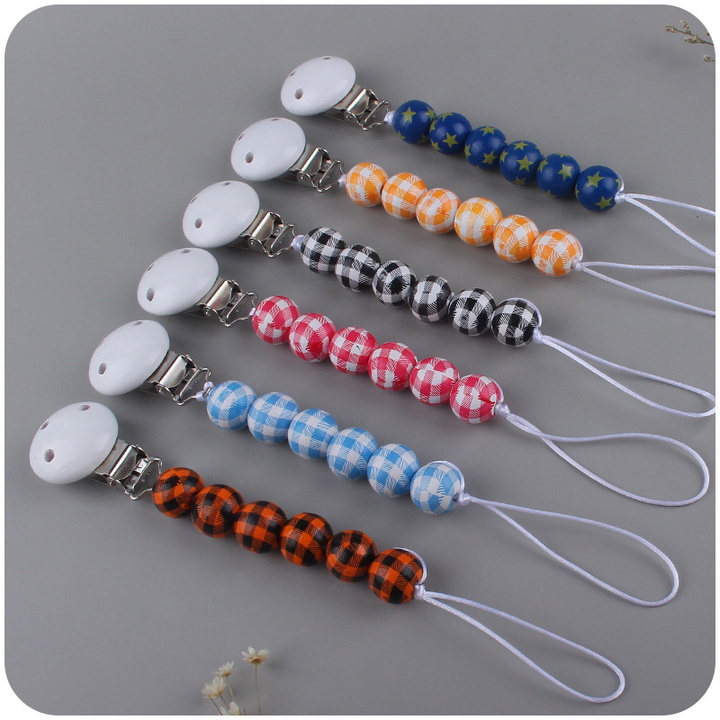 Nuevos suministros para bebés Hemu clip calmante bebé patrón a cuadros cuentas Cadena de pezón cadena anti-caída Amazon