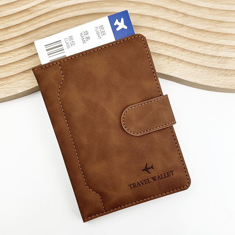 Transfronterizo spot Amazon pu pasaporte de cuero esta cubierta de protección empalmado paquete de pasaporte de hebilla magnética puede fijar el logotipo del clip de pasaporte