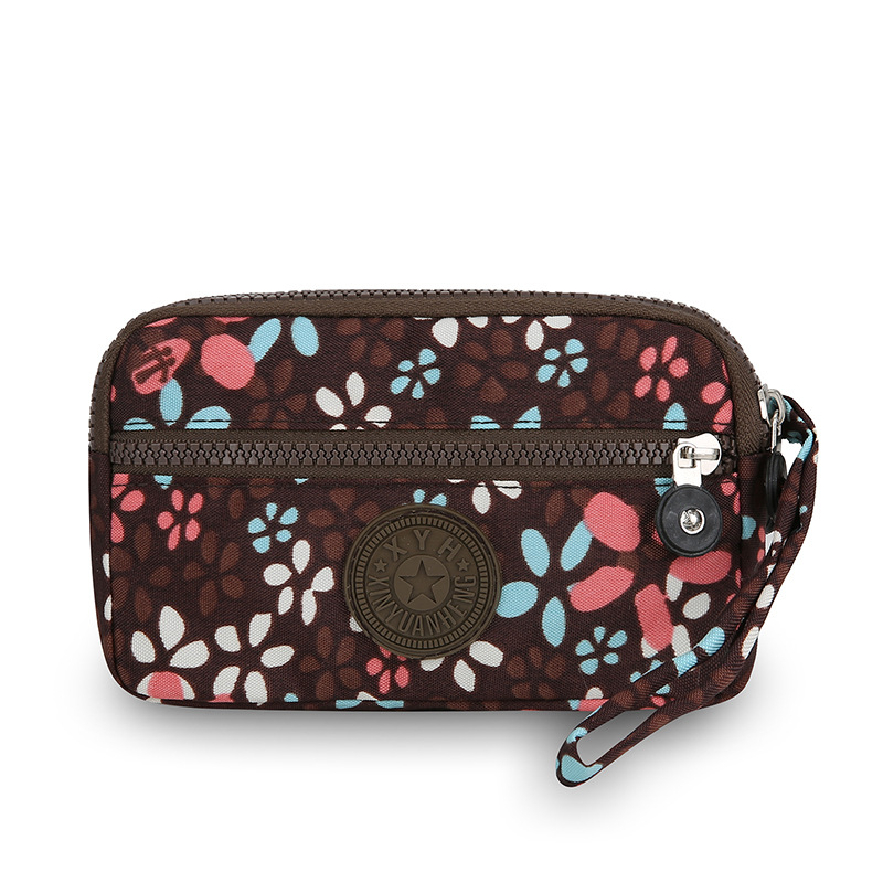 2025 nuevo bolso de mujer multifuncional bolso de cambio portátil bolso de mano de moda de mediana edad simple bolso multicapa bolso móvil
