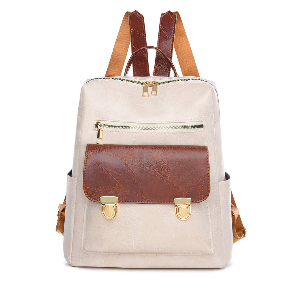 Mochila de cuero suave para mujer 2025 moda moda color sólido mochila para mujer versión coreana de la mochila de viaje impermeable de gran capacidad