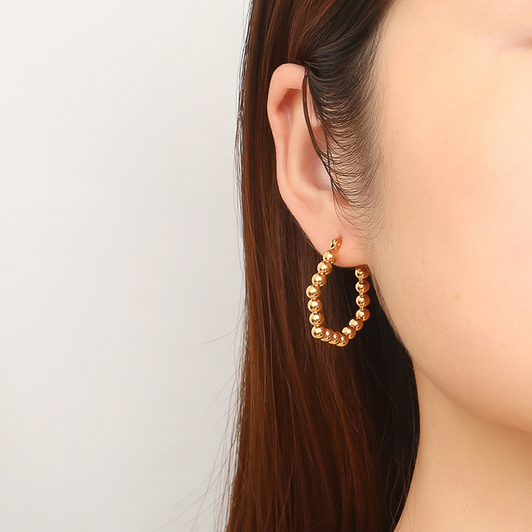 Pendientes ovalados chapados en oro de acero inoxidable pendientes de alto grado pendientes de círculo pendientes de nicho pendientes personalizados al por mayor