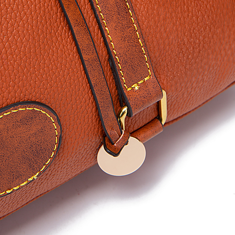 Nieuwe handtas voor dames met korrelig kiezelpatroon en contrast_voghion.com