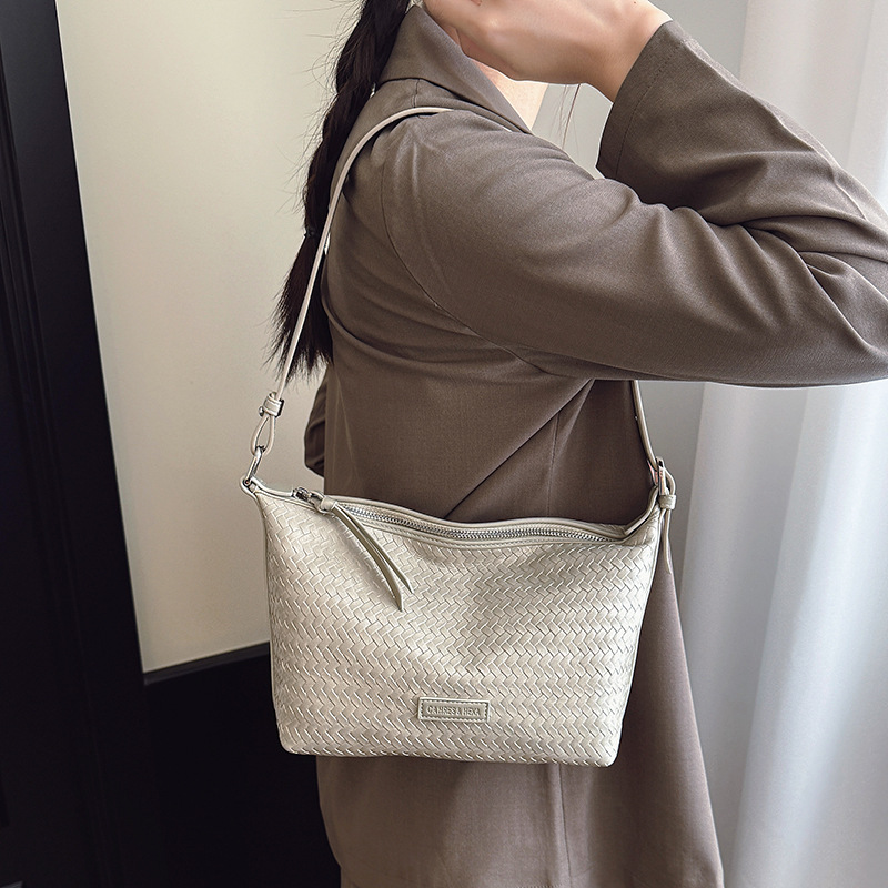 2025 otoño y invierno nuevo nicho retro tejido bolso de brazo de moda de mujer bolso de hombro de gran capacidad bolso de mochila