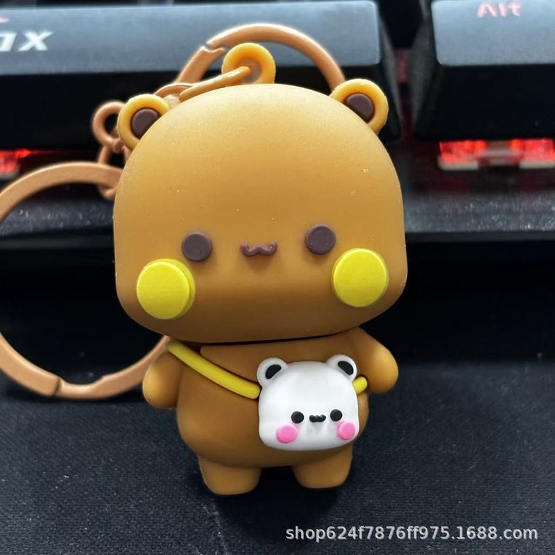 新商品の一二布の鍵はかばんを掛けて学生のカップルのアニメのかわいい周辺の爆発金の高い顔の値のネットの赤を掛けます。|undefined
