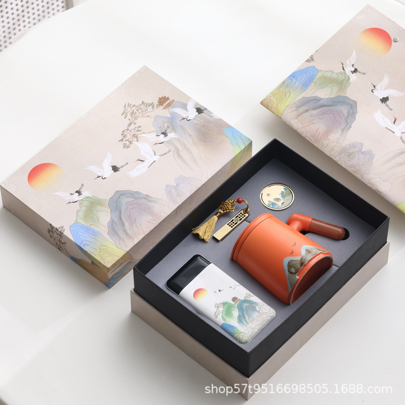 Taza de cerámica Jiangshan set de regalo de taza de marca de filtro de taza de agua de negocios de talla LOGO publicidad al por mayor