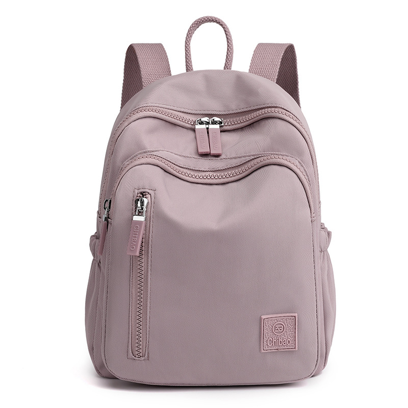 Mochila sencilla e informal para mujer, bolso portátil de gran capacidad para viajes y desplazamientos, mochila versátil de tela de nailon de gran capacidad para mujer