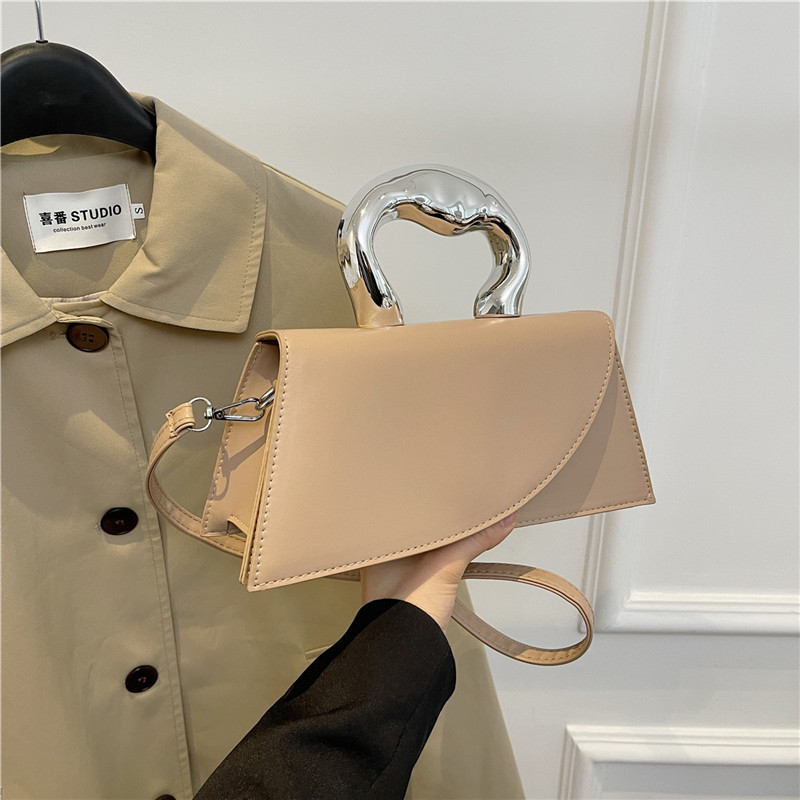 Nicho francés popular bolso de color sólido bolso de mujer 2024 verano nuevo estilo simple ocio red mochila de hombro