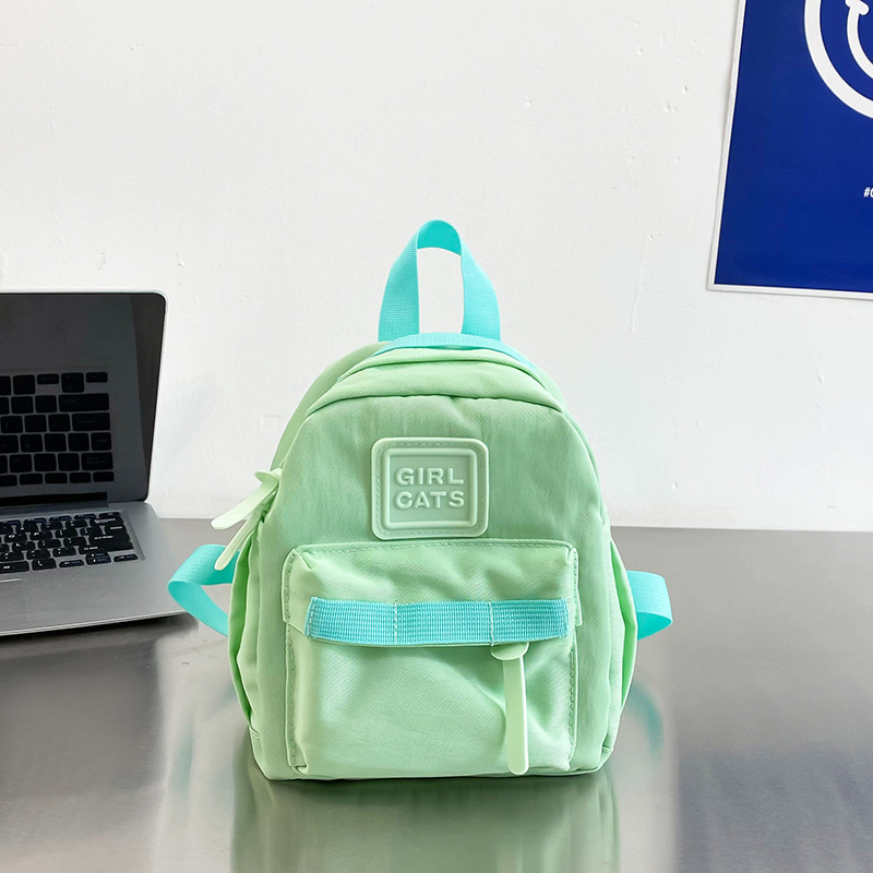 Nuevo estilo japonés de los niños de color sólido mini mochila lindo niños y niñas mochila simple kindergarten schoolbag