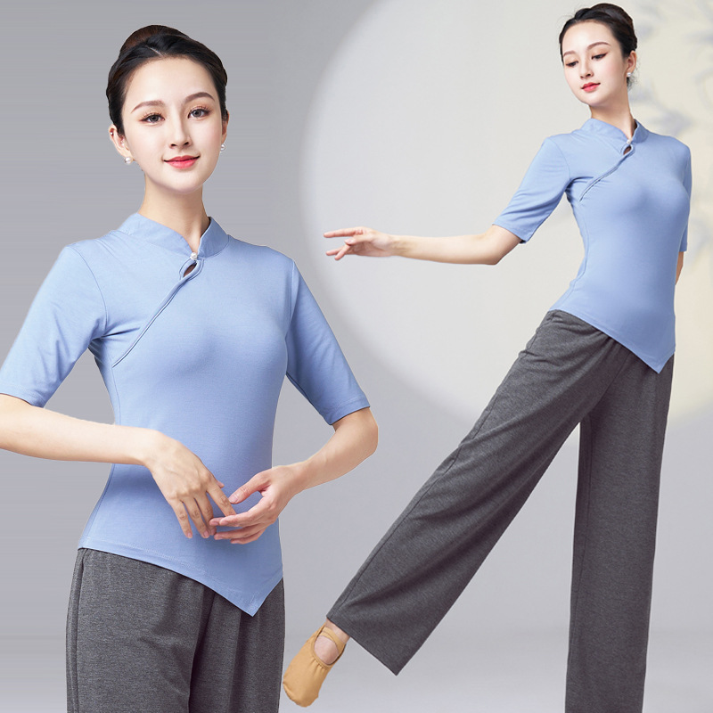 Classic dance attire: women's trendy cheongsam-style top with mandarin collar, paired with wide-leg, straight-cut pants featuring functional pockets.